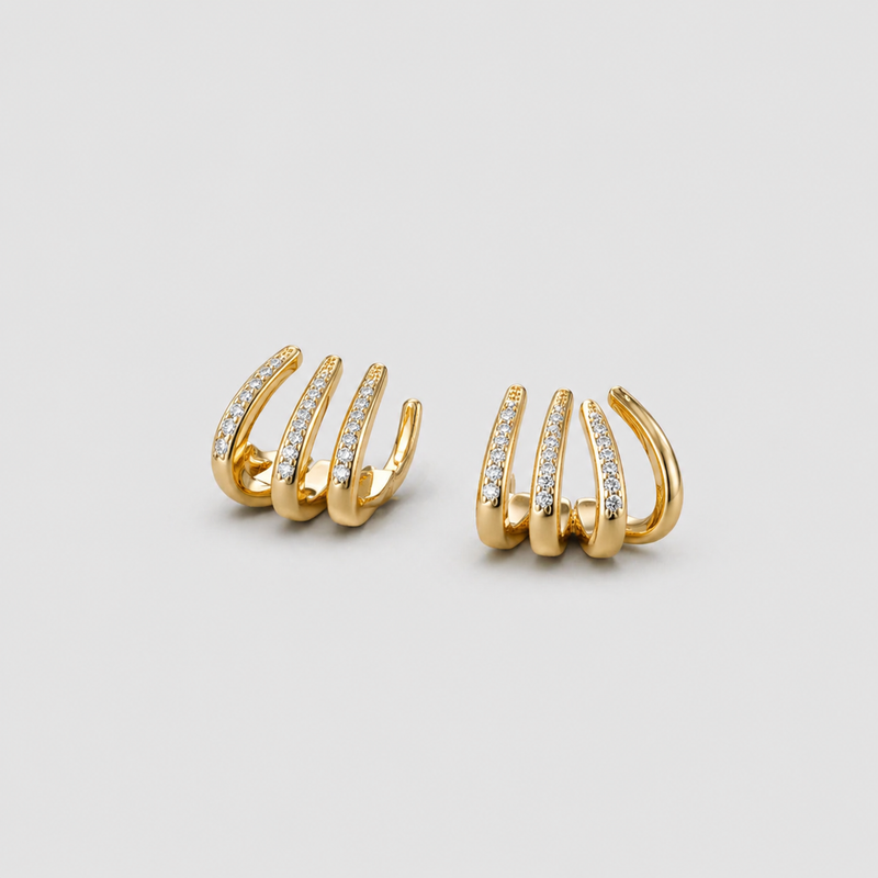 Boucles d’oreilles Griffes | Plaquées or avec zircons